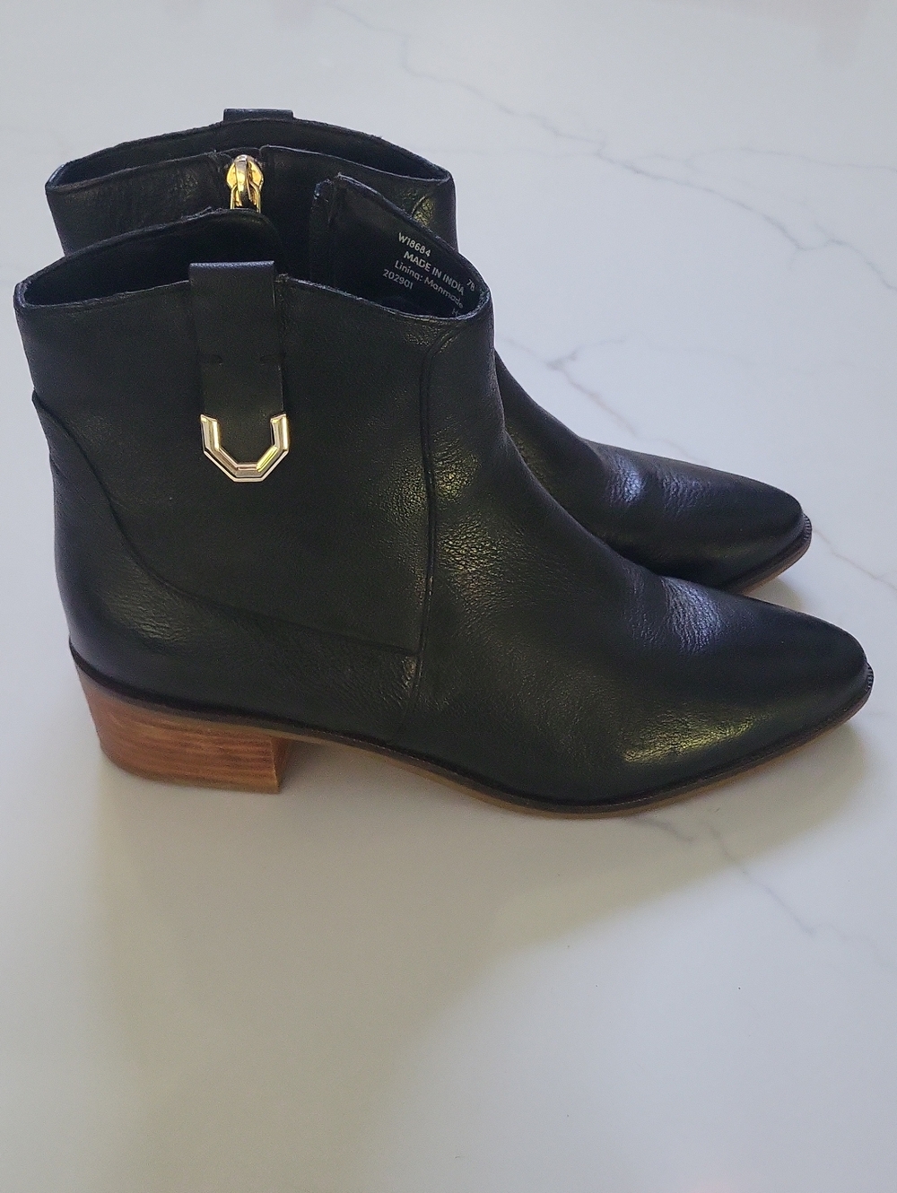 Cole Haan Black Leather Ankle Booties with Gold Accent